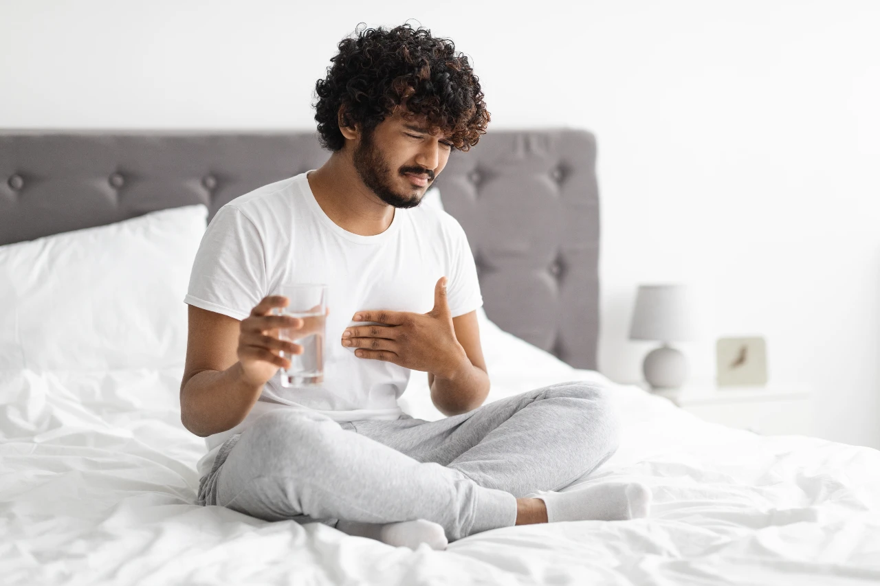 If you’re waking up with heartburn, you may be wondering what the best sleeping position for acid reflux is